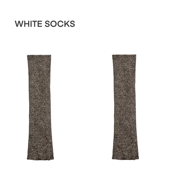 Brown and grey gathered knit leg warmers styled with white sneakers