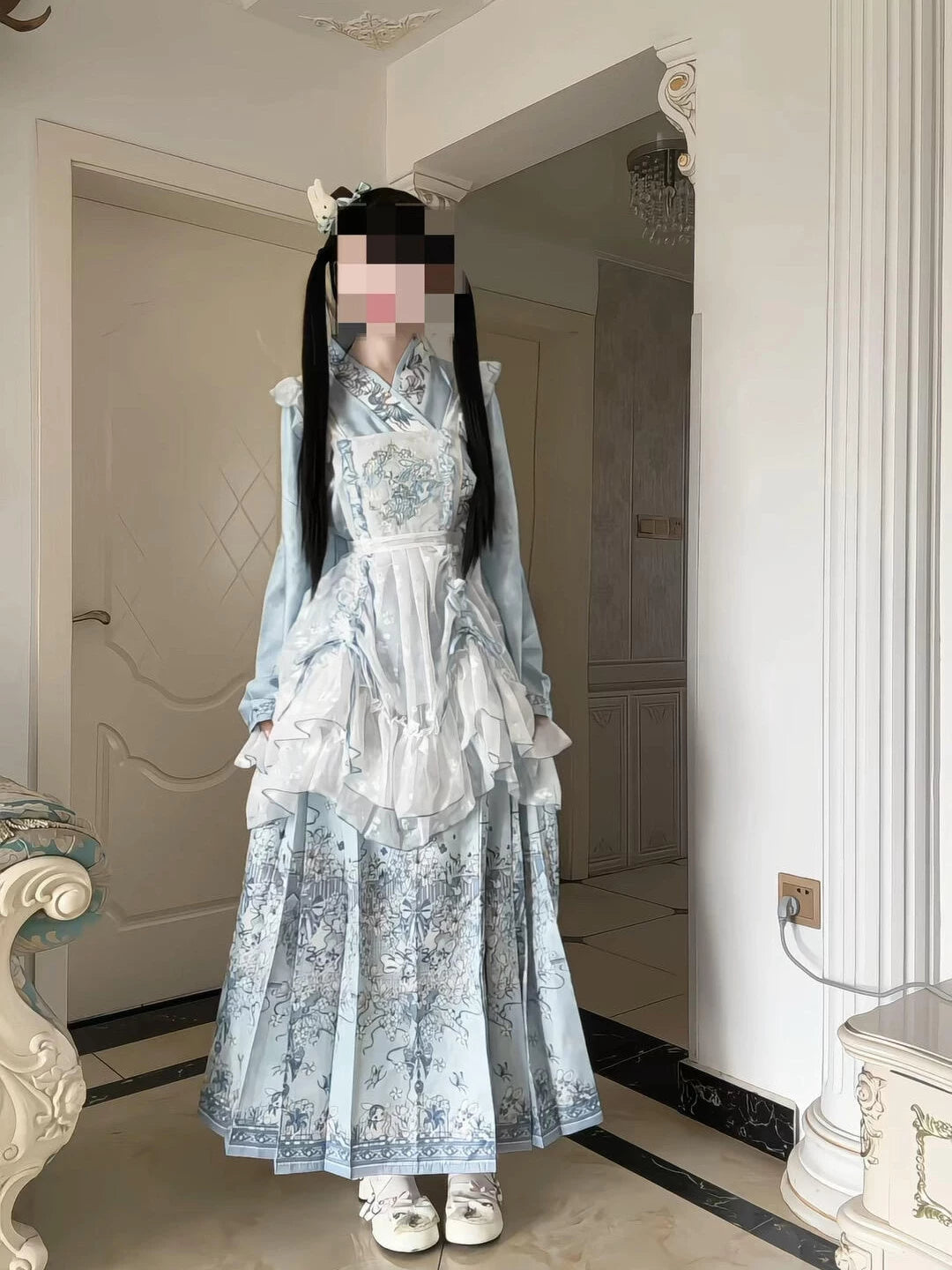 Blue Hanfu outfit set with layered skirts shown in a full-length room photo