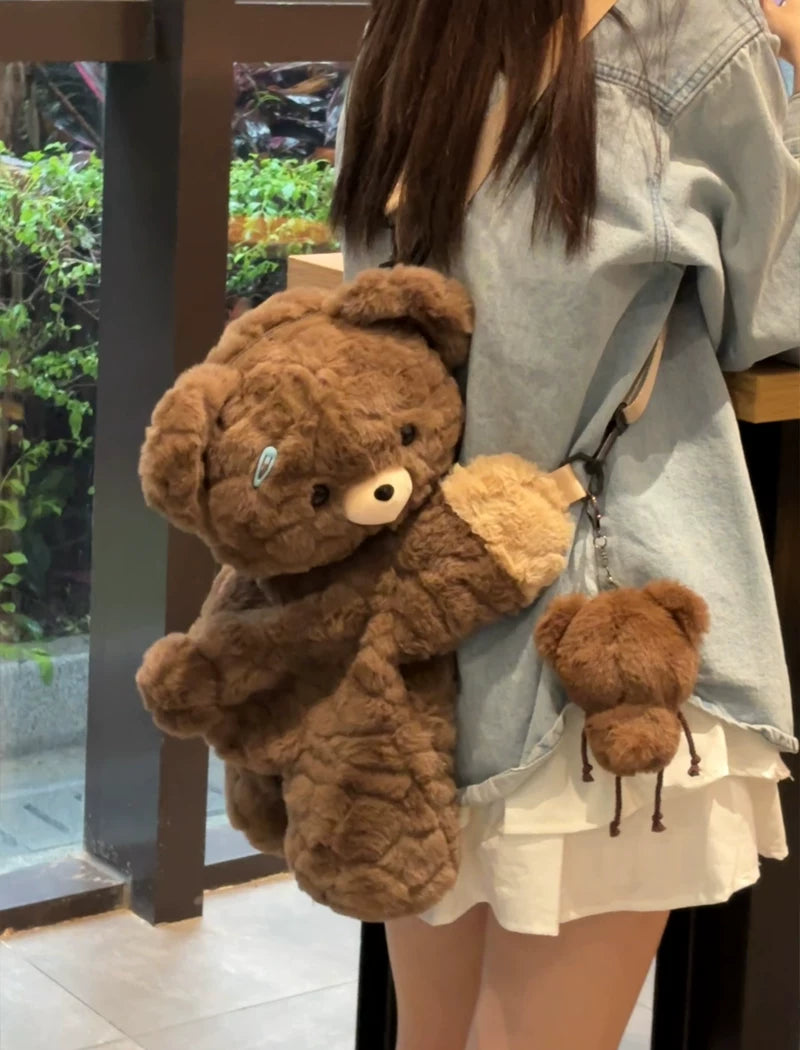 LambGuli plush animal flop bags showing Little Bear Guli and Red Panda variants with crossbody and backpack straps