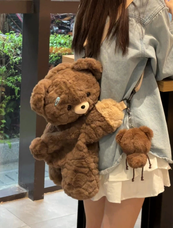 LambGuli plush animal flop bags showing Little Bear Guli and Red Panda variants with crossbody and backpack straps