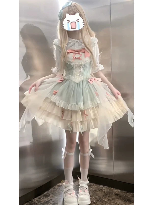 Creamy mint-green and pink JSK dress with layered ruffles and side train