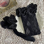 One pair of black lace stockings / One Size