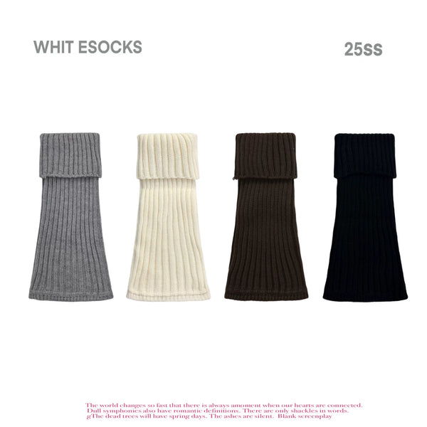 Ribbed knit slouchy leg warmers in grey, styled with argyle tights and platform loafers