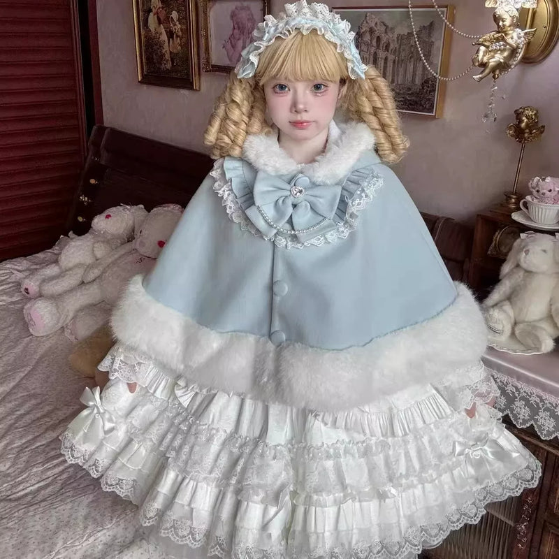 Blue Rabbit Peach cat-ear cape shown worn, front view