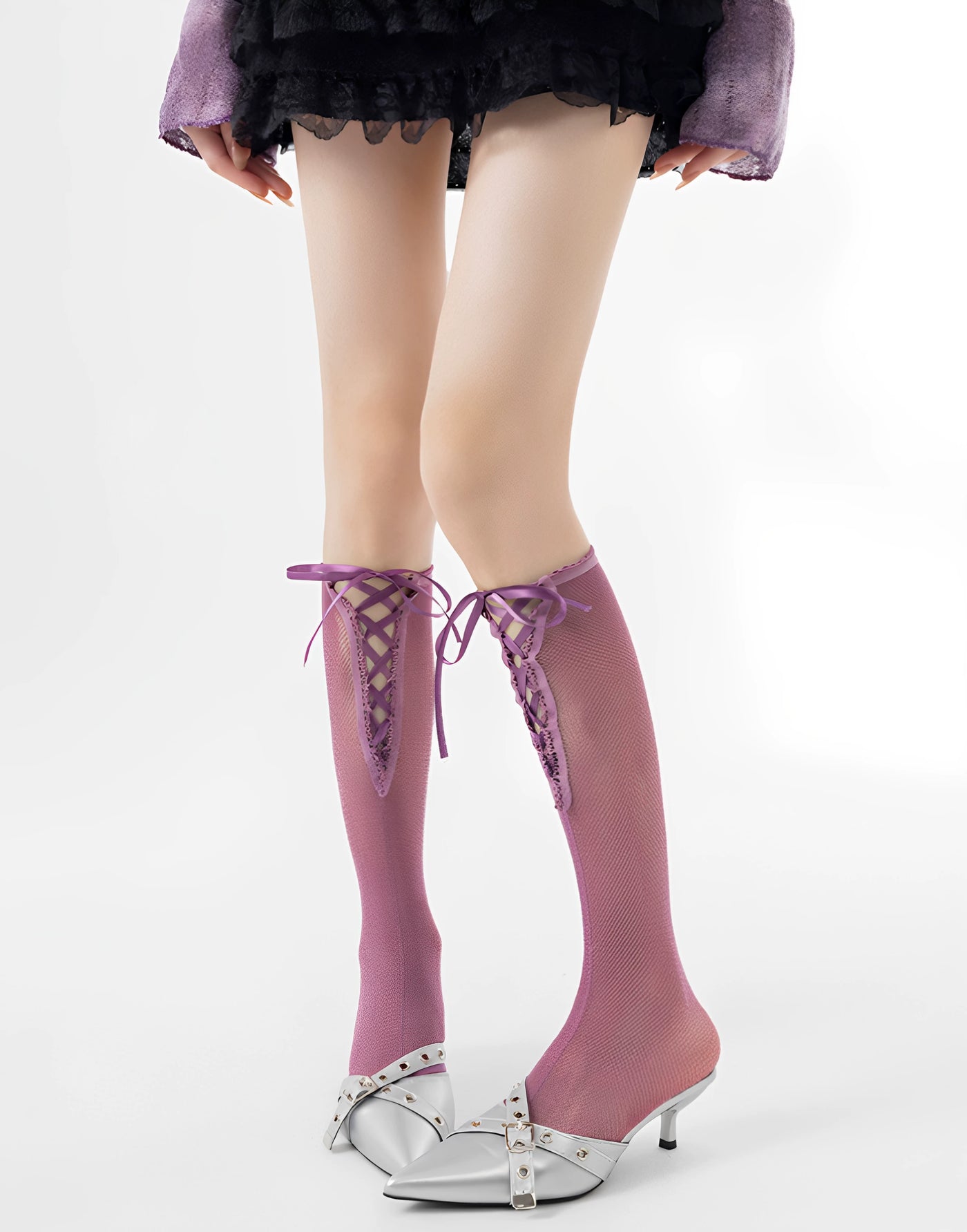 Pink calf socks with crossed ribbon ties and a softly gathered shape.