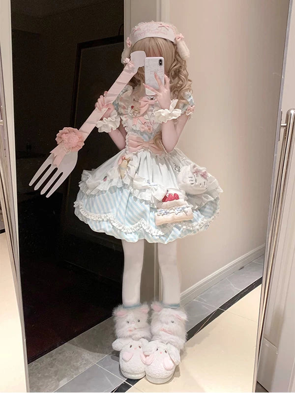Sweet Lolita blue one-piece dress set with apron and coordinated accessories, tiered ruffled skirt, pastel floral print