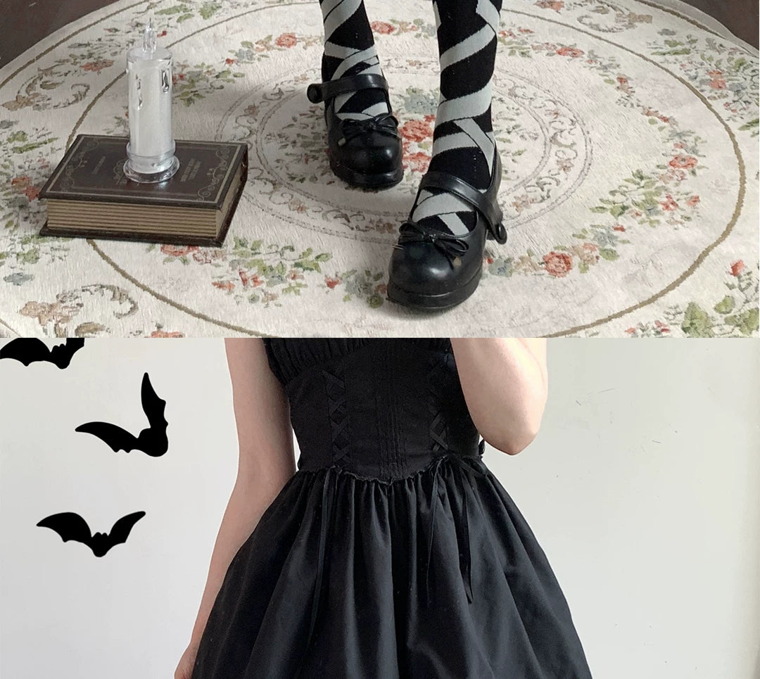 Black and white over-the-knee socks with diagonal ribbon graphics and scissors motifs