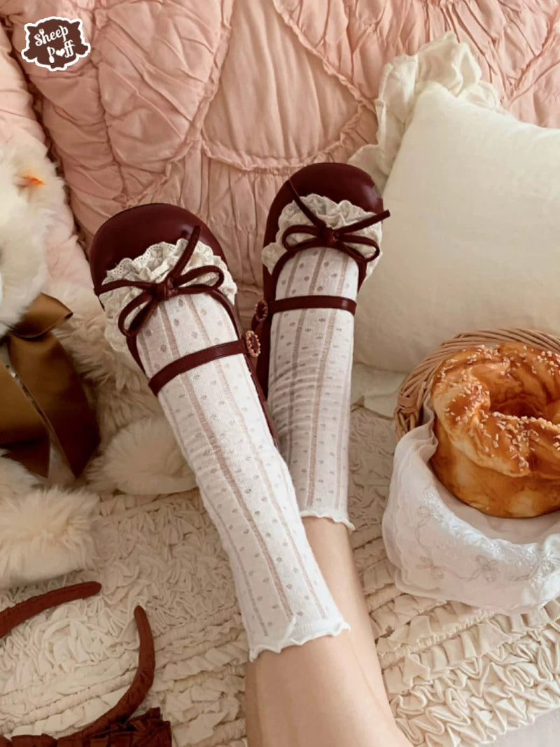 Sheep Puff Little Leila mid heel Lolita shoes in pastel pink with bow accents, featuring a cute and elegant design.