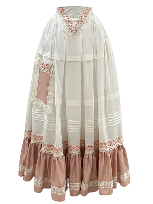 White and lotus-root full skirt styled outdoors with a voluminous tiered silhouette.