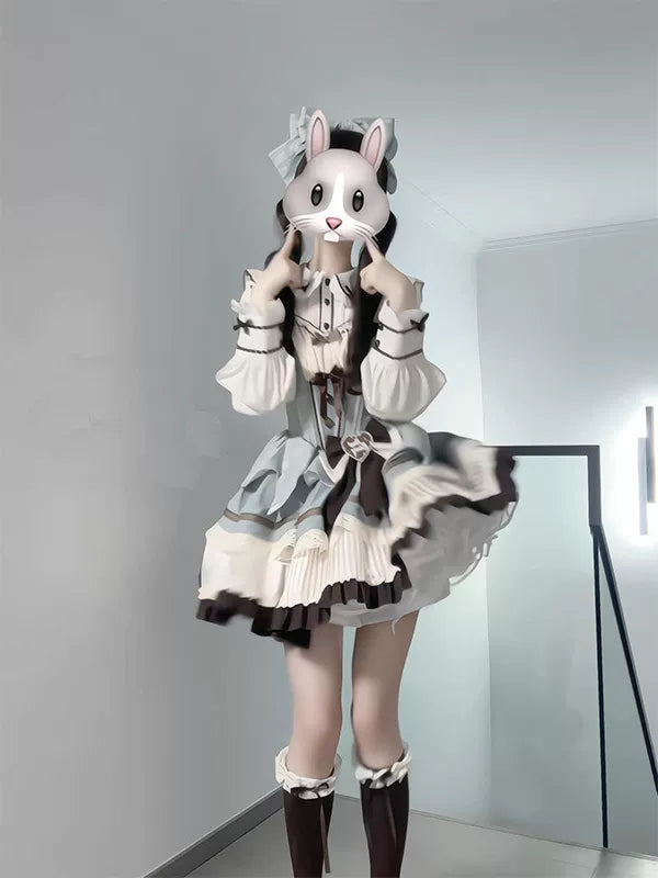 Mint-and-chocolate JSK outfit with a long-sleeve shirt, waist bow and KC headpiece, shown on a model.