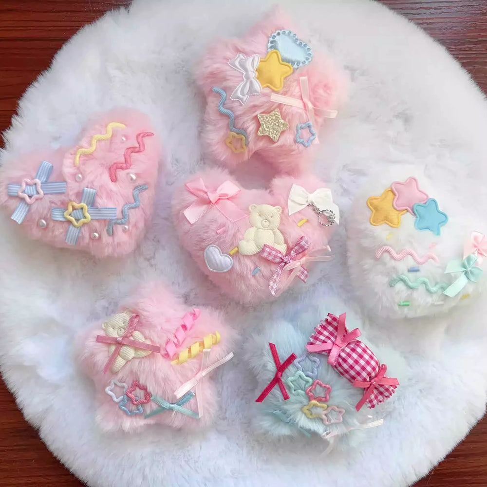 Pastel fluffy star and heart accessories with ribbons, pearls, and appliqués