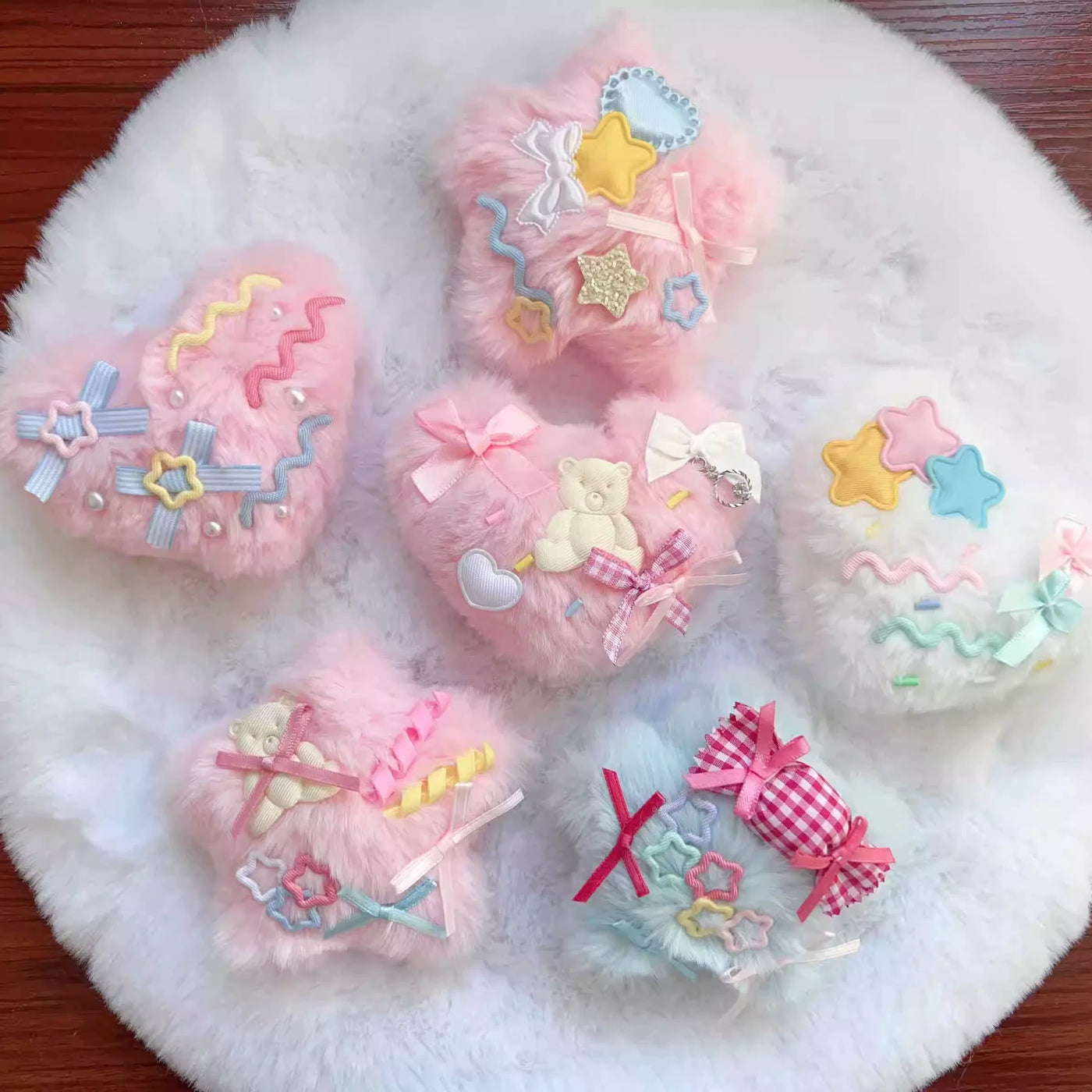 Pastel fluffy star and heart accessories with ribbons, pearls, and appliqués