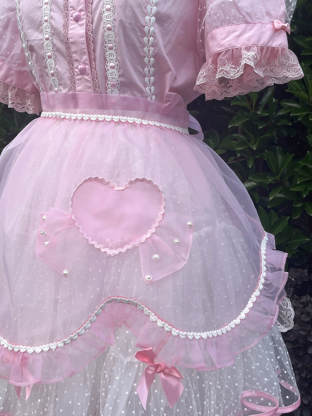 Galette Bunny pink Lolita apron with petal ruffles and heart flocking