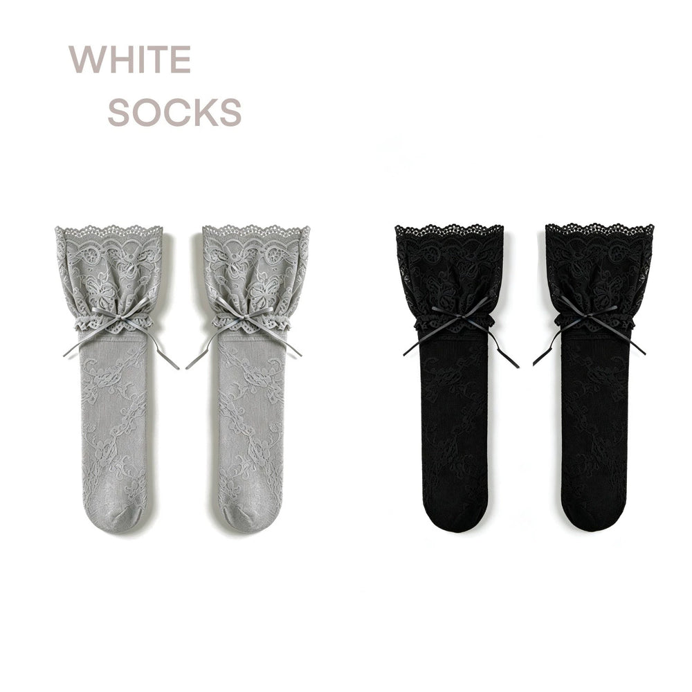 White Socks lace mid-calf socks in grey and black with scalloped cuffs and ribbon ties