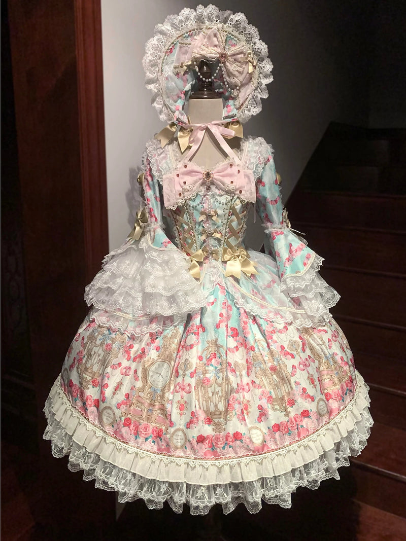 Pink Sweet Lolita OP dress with ornate print and tiered skirt on mannequin