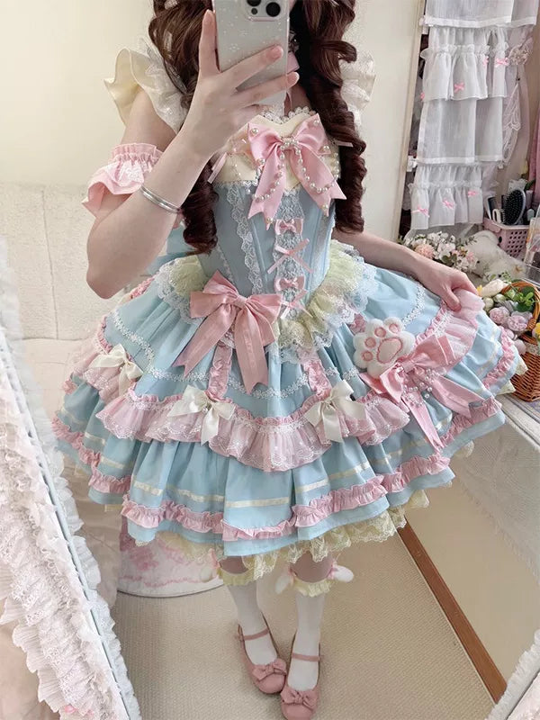 Pastel blue and pink JSK dress with layered ruffles, bows and lace
