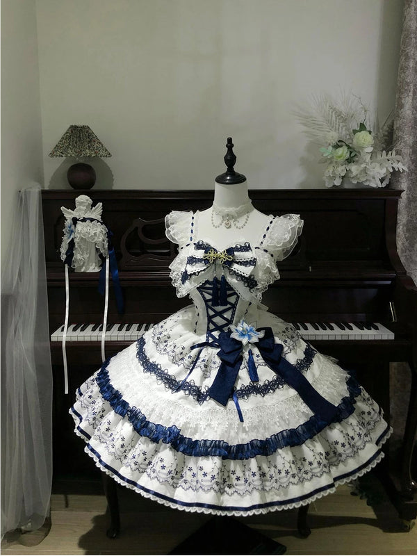 Blue-and-white floral JSK with layered lace tiers displayed on a mannequin.