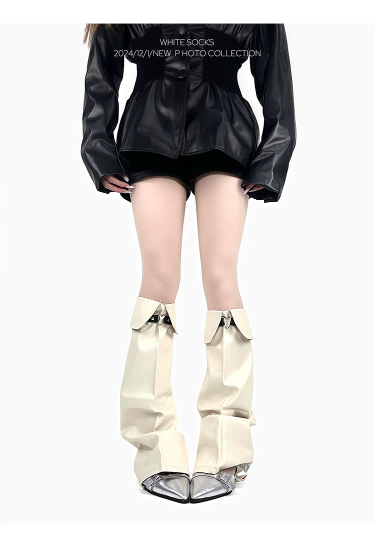Black PU slouchy leg warmers with a heart-shaped strap styled with metallic shoes