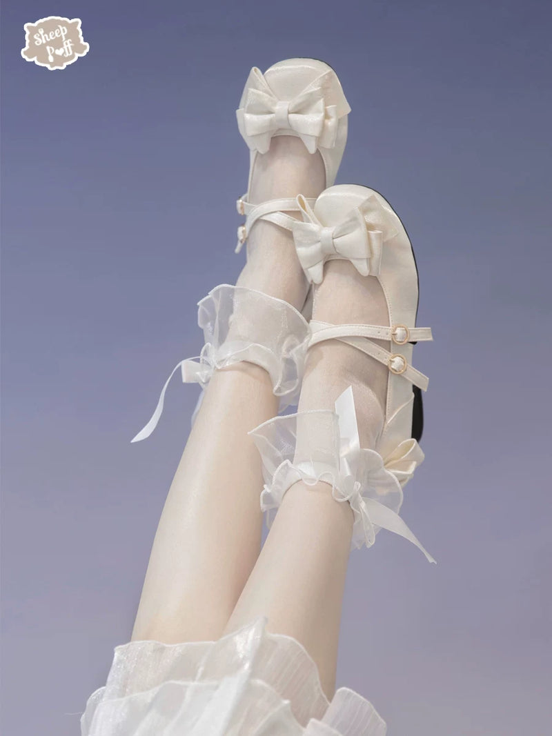 Sheep Puff Little Kate satin gloss mid heel Lolita shoes in soft pink with bow detail and rounded toe.