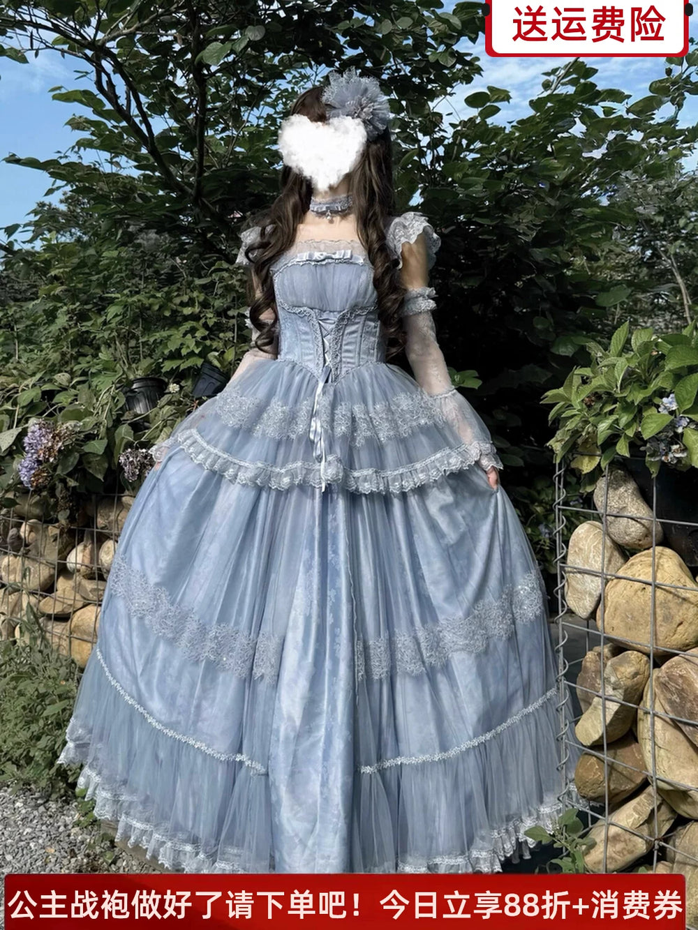 Emoji Dream Misty Forest lolita dress in soft periwinkle blue with sheer cropped bolero and tiered skirt