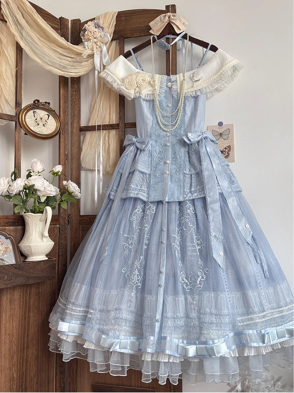Blue top and skirt set with floral embroidery, pearl strands and lace trim