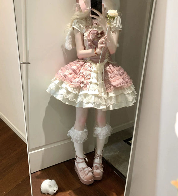 Creamy pink three-piece Lolita set with a front bow, white lace trim and layered skirt