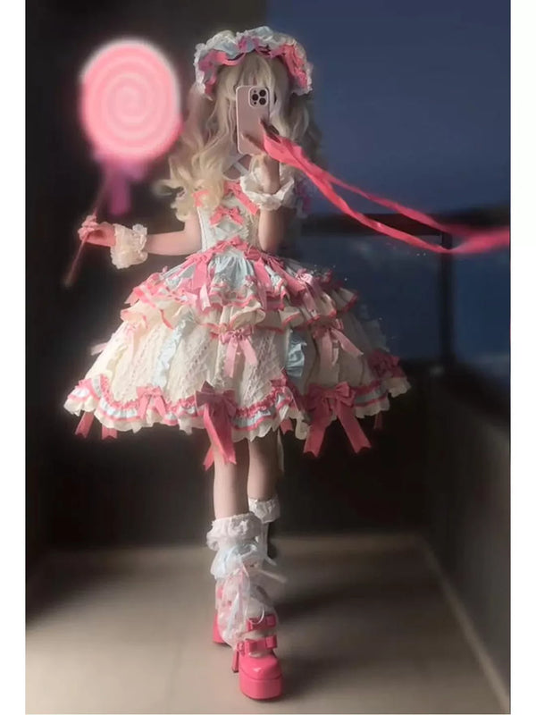 Mint, pink and white Lolita OP dress with bow-trimmed layers, hat and trailing train