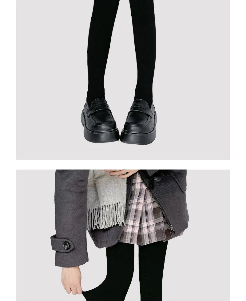 Matte black tights styled under a plaid skirt and black platform loafers.