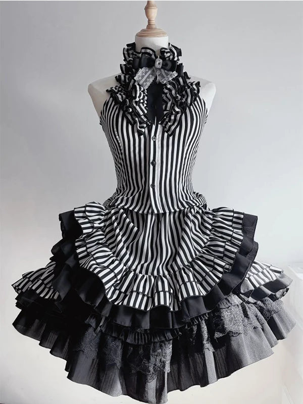 Black-and-white striped halter top and tiered skirt set displayed on a mannequin.