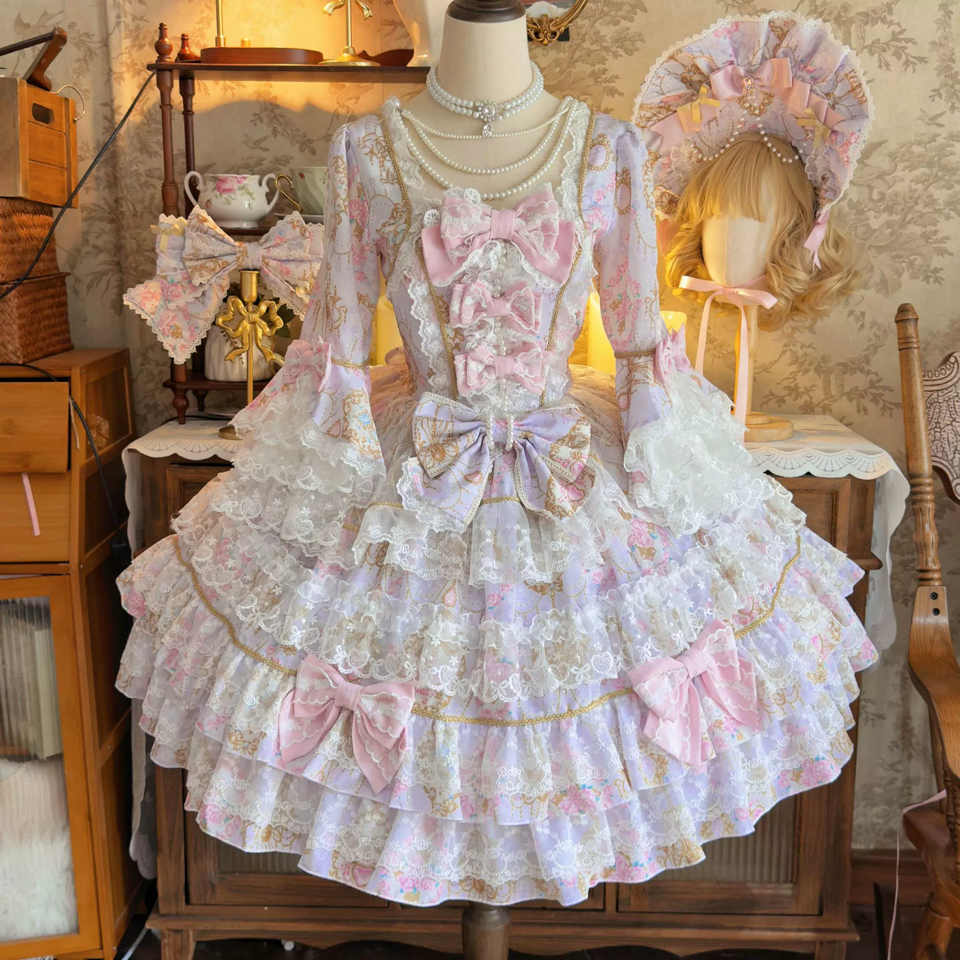 Lady Han Sweet OP dress by Lolita Fetch featuring a candelabra chapter design, displayed on a mannequin with intricate lace details.