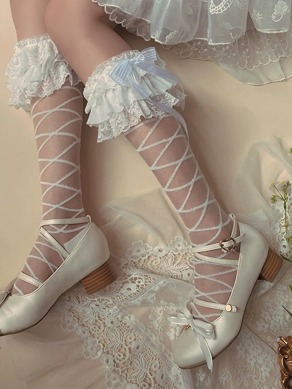White lace calf socks with crisscross ribbon bands and ruffled cuffs