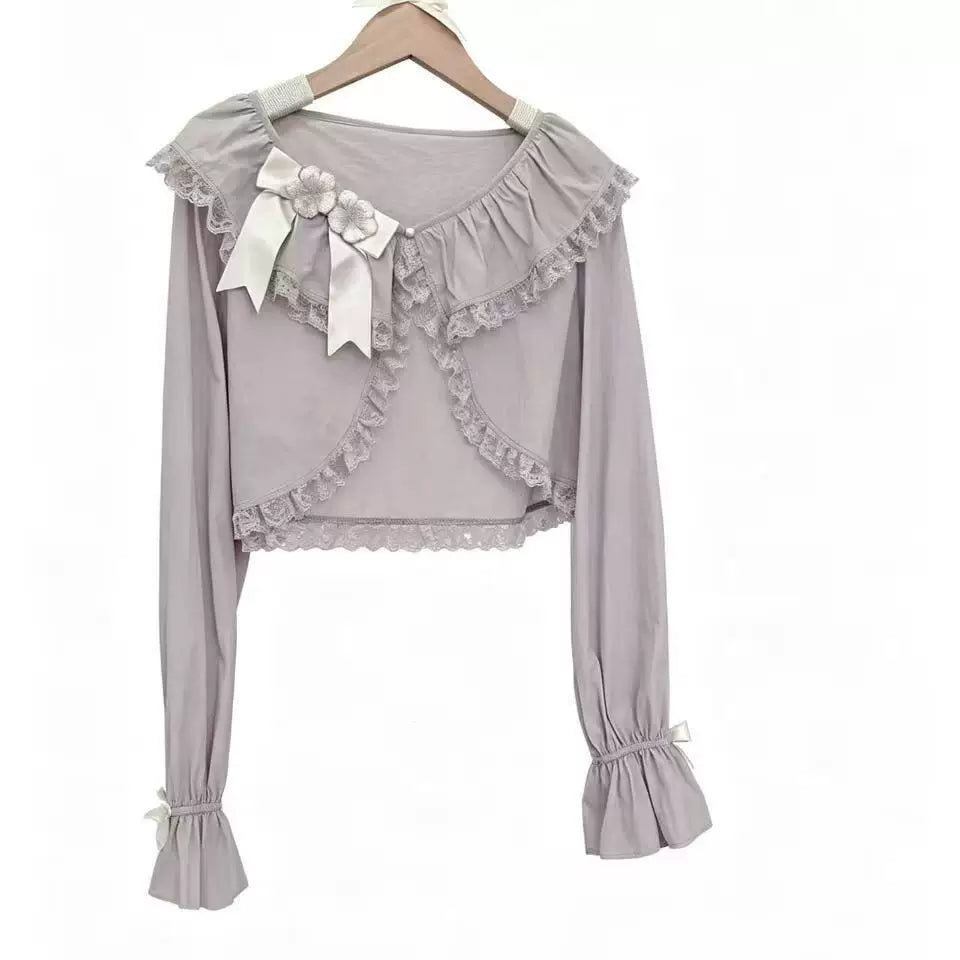 White Sweet Lolita cropped lace cardigan with bow accents, long sleeves, and ruffled collar