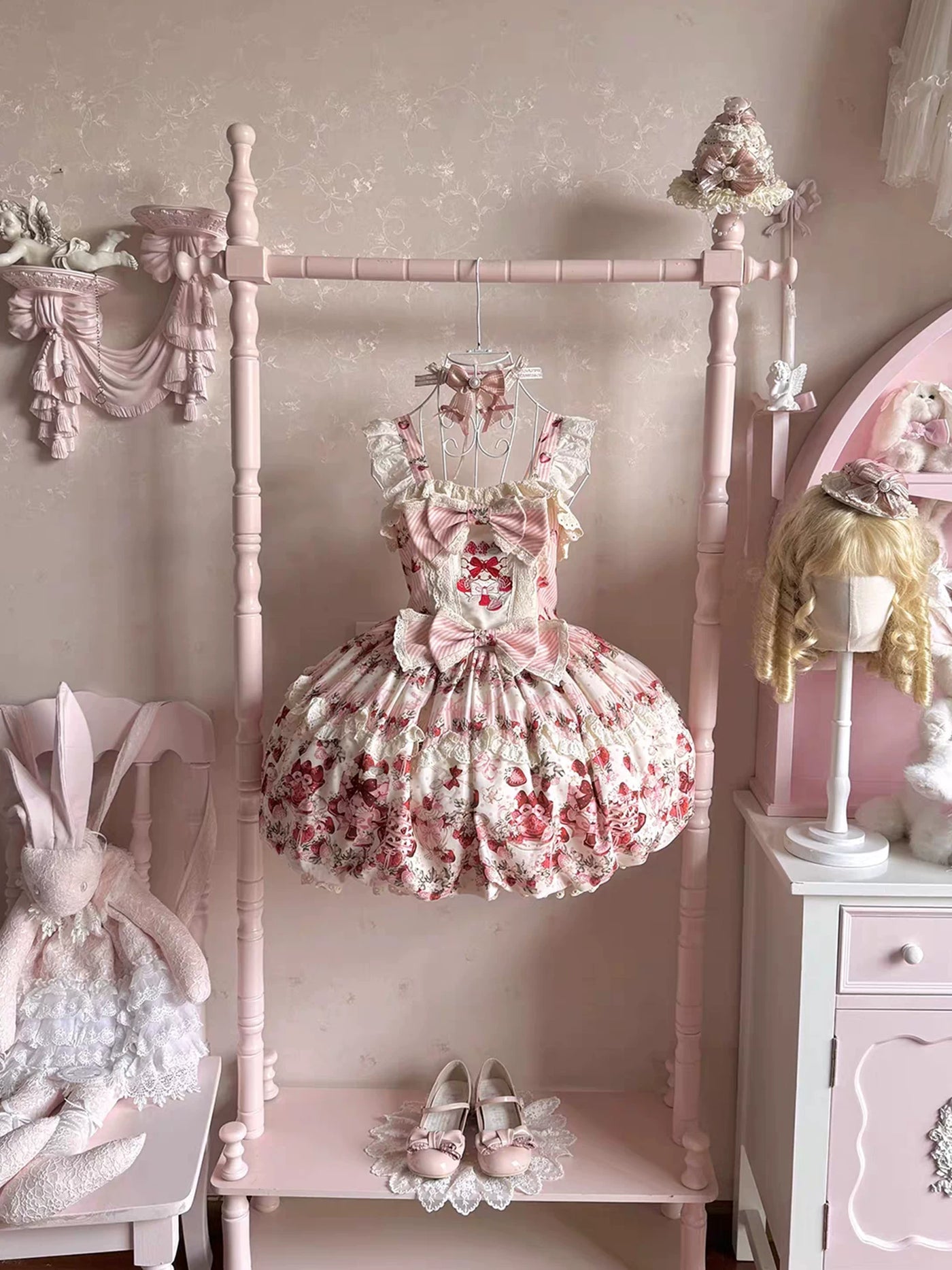 Close up of pink and white striped bow on bodice