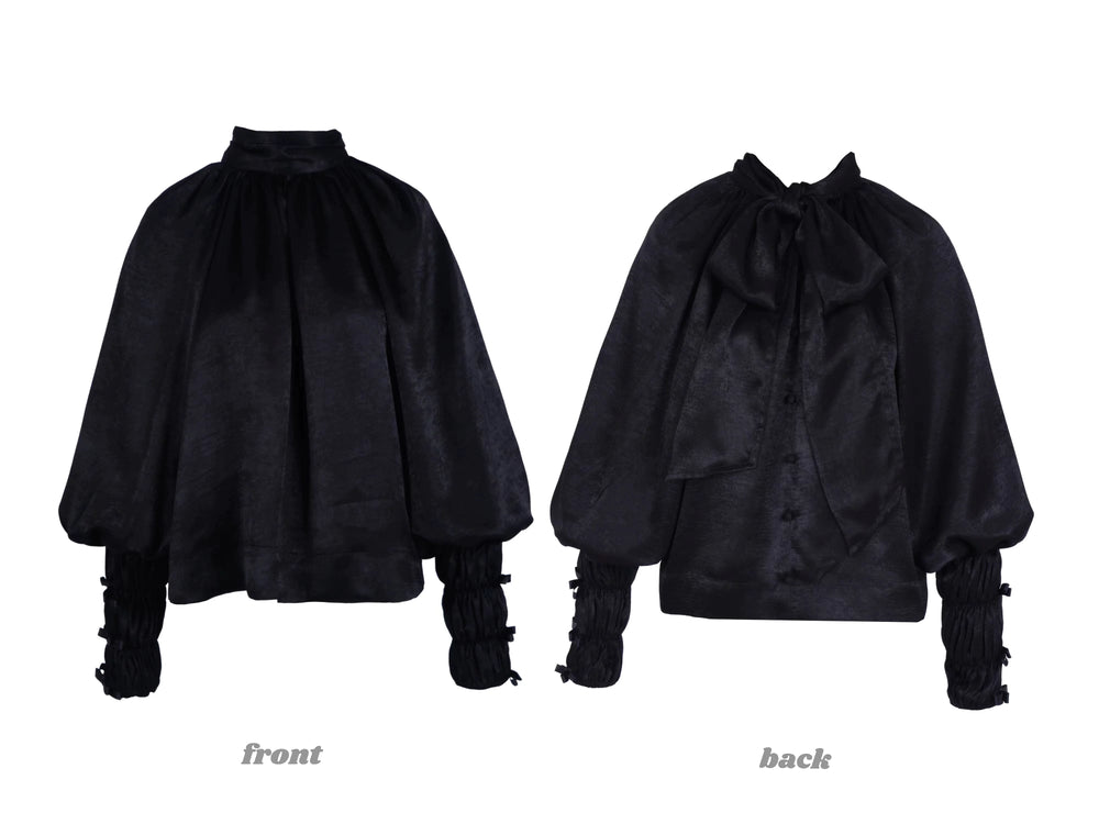 Nololita black spiderweb top displayed front and back