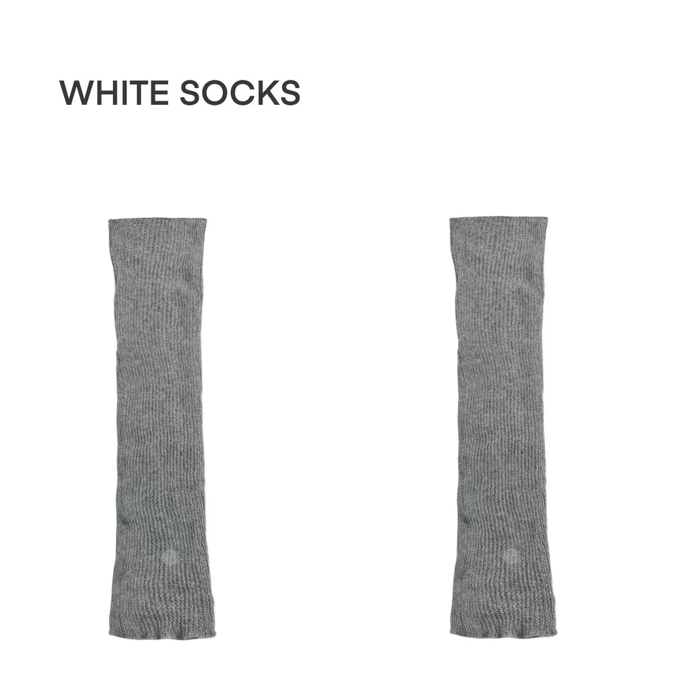 White Socks grey knitted slouch leg warmers with fold-over cuffs styled over white sneakers