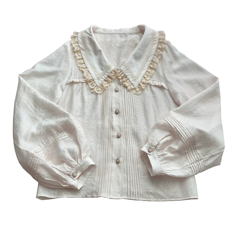 Light beige long-sleeve Lolita shirt with a lace-trimmed V-neck collar, lantern sleeves and pleated front.