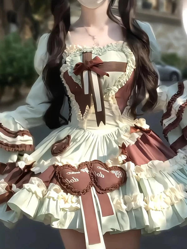 Creamy mint-and-chocolate JSK dress with princess-sleeve vest and ruffled trim