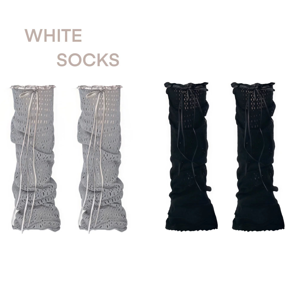 White Socks openwork leg warmers with ruffled edges and ribbon lacing styled with patterned tights.