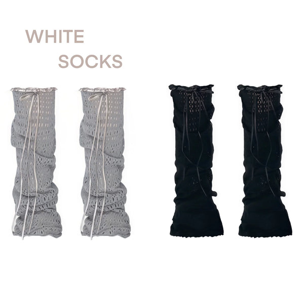 White Socks openwork leg warmers with ruffled edges and ribbon lacing styled with patterned tights.