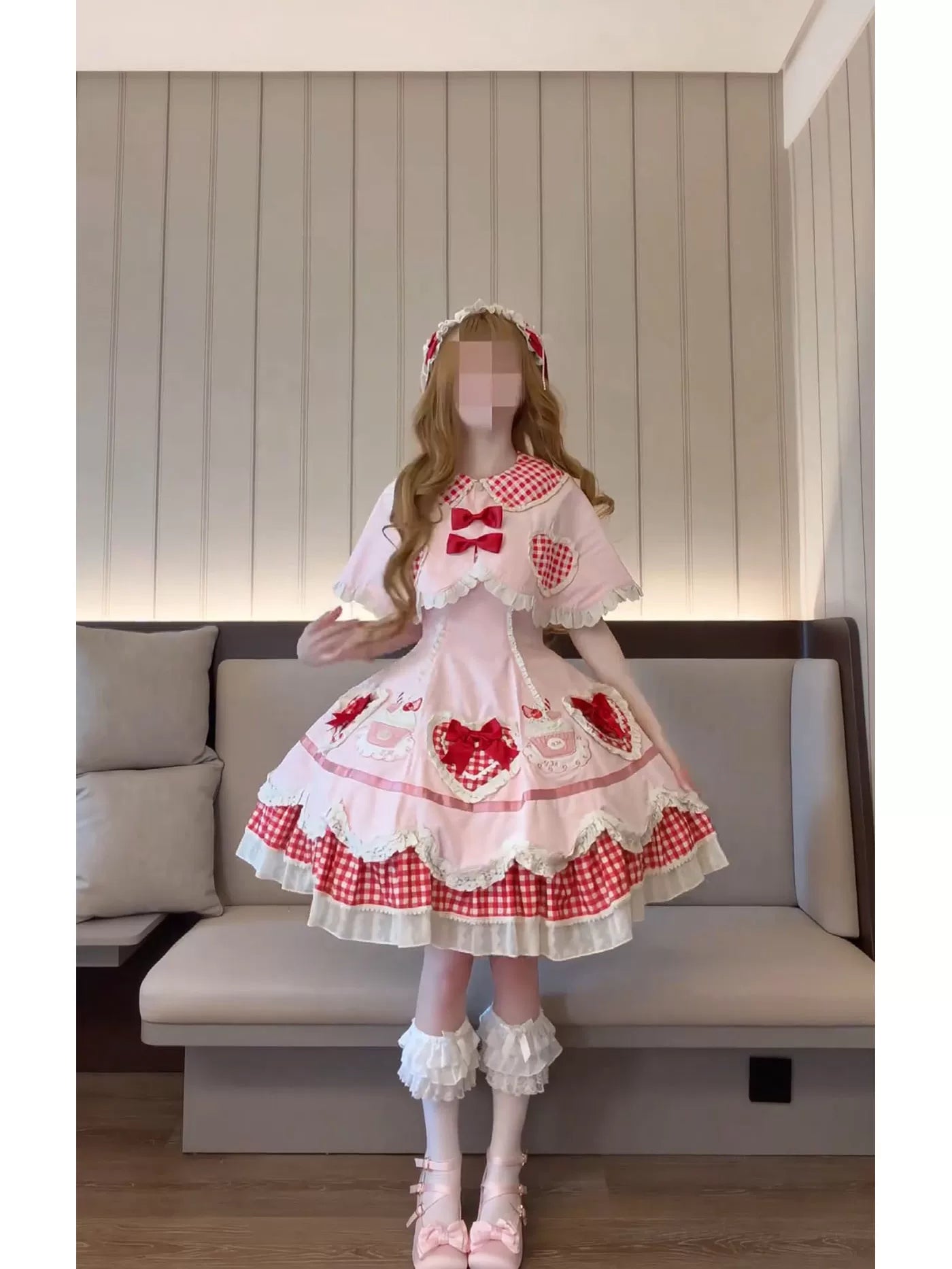 Pink Sweet Lolita dress with tiered cake skirt and grid overlay