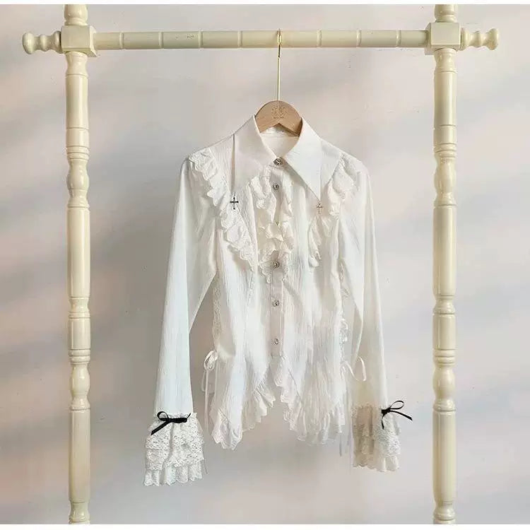 Black gothic lolita waist-cinched button-up blouse with silver cross accent and lace trim