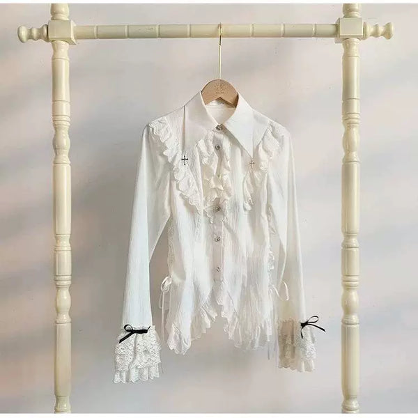 Black gothic lolita waist-cinched button-up blouse with silver cross accent and lace trim