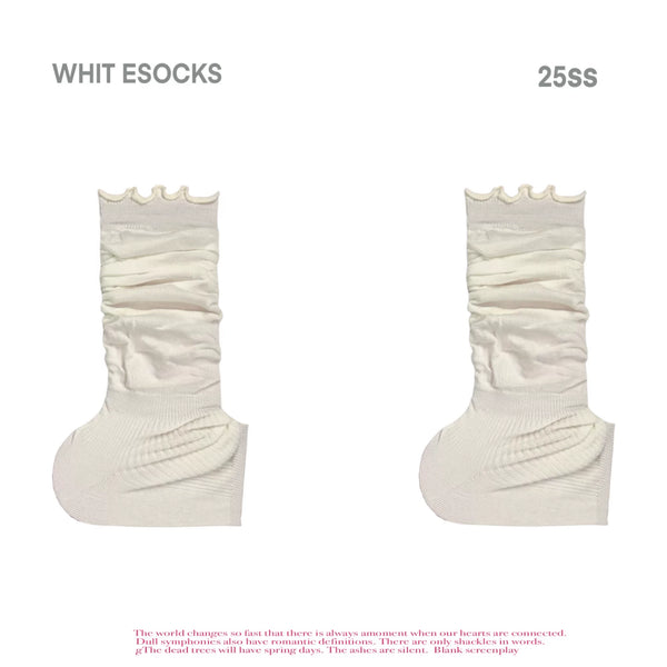 White gathered stirrup socks with ruffle cuffs shown in a product layout.