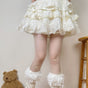 One pair, beige bows / Tights only, sock covers not included