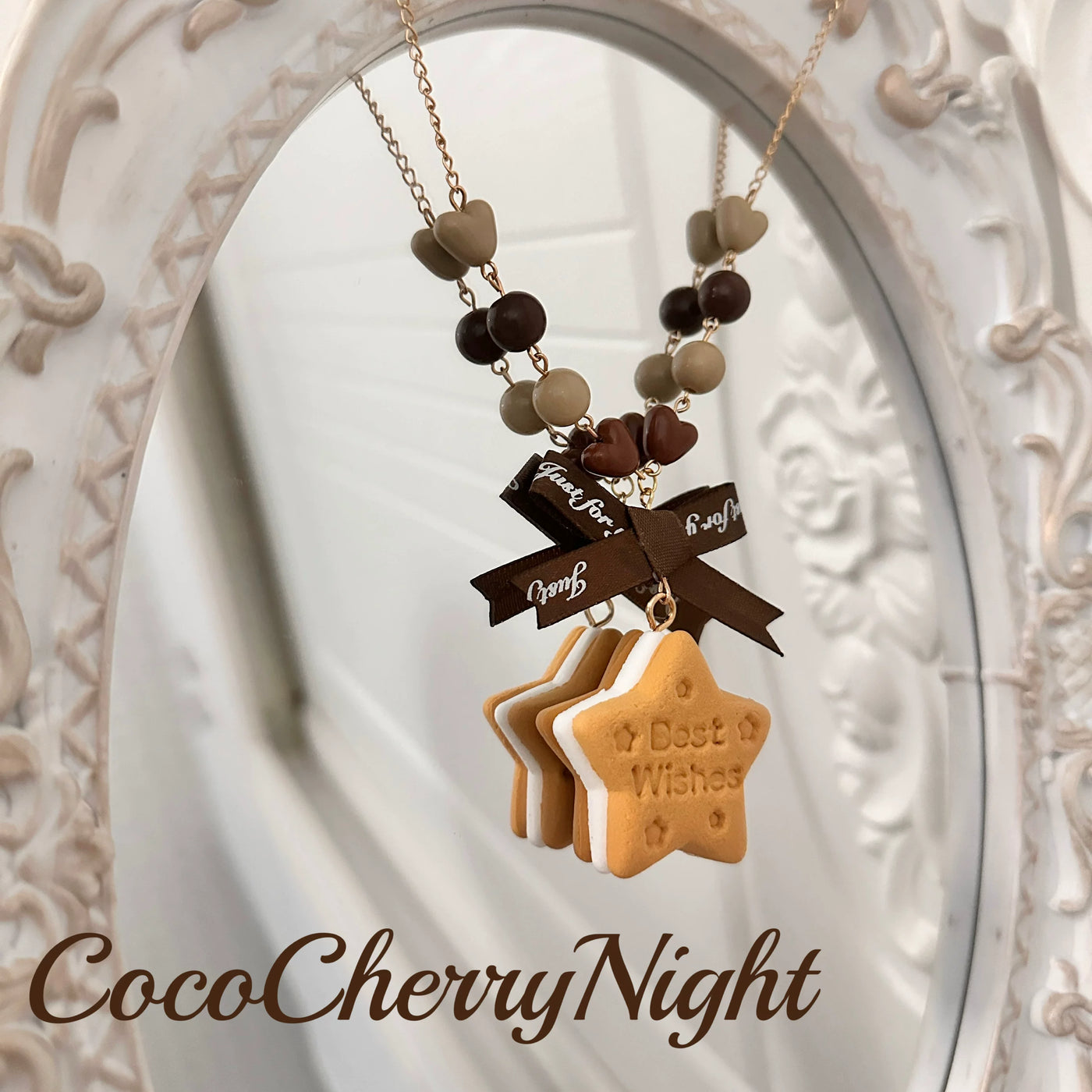 Star-shaped biscuit necklace with brown bow, heart accents and chain options