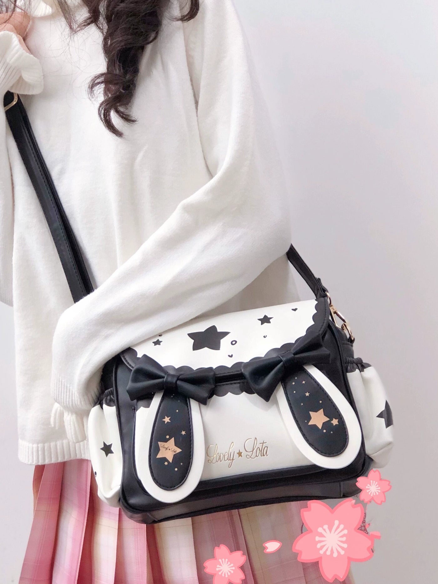 LovelyLota small crossbody bag with bunny and star motifs in contrast black and white