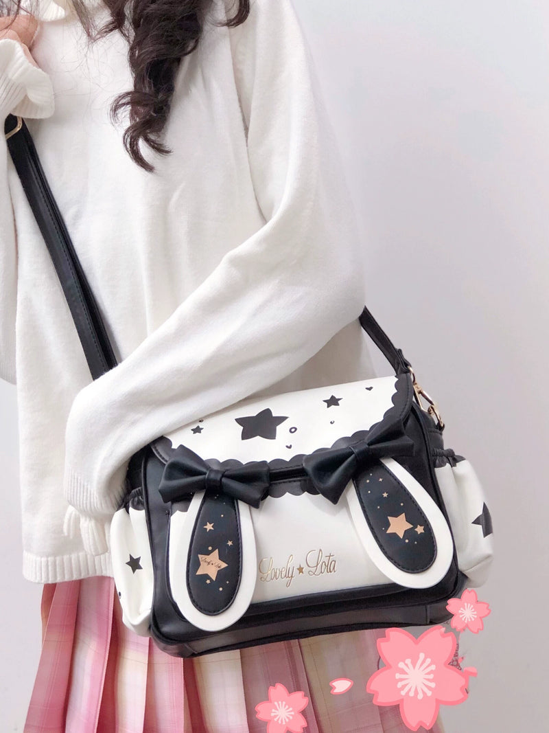LovelyLota small crossbody bag with bunny and star motifs in contrast black and white