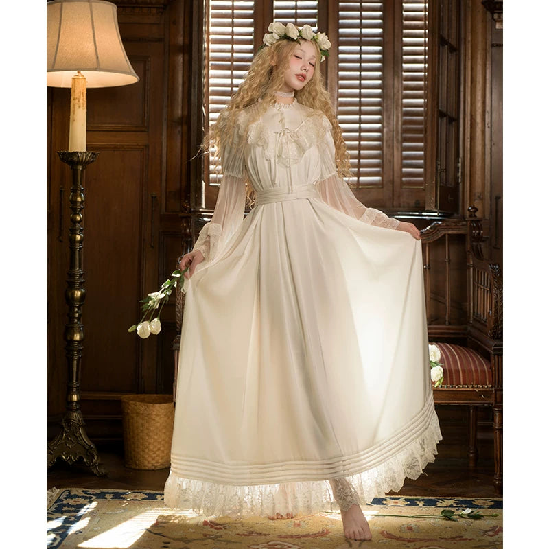 White Edwardian one-piece Lolita dress with wide lace cuffs and long skirt