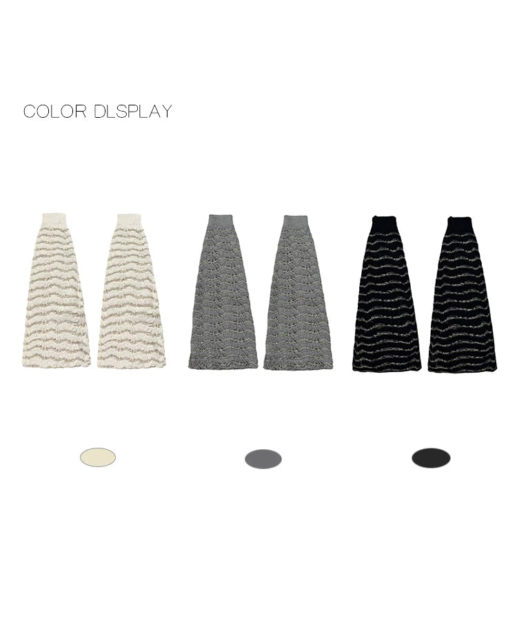 Wave-textured slouch socks shown in off-white, grey and black colour options.
