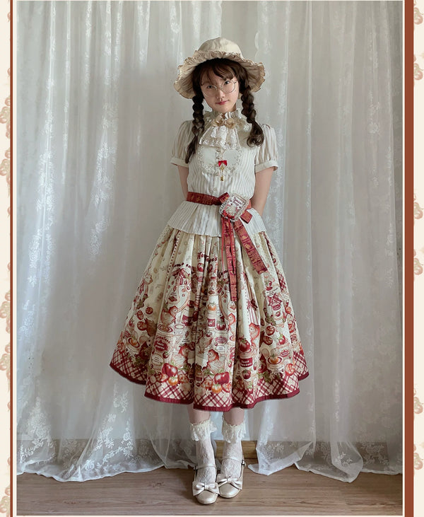 Red-and-cream tomato-print Lolita dress with gingham accents styled on a model.